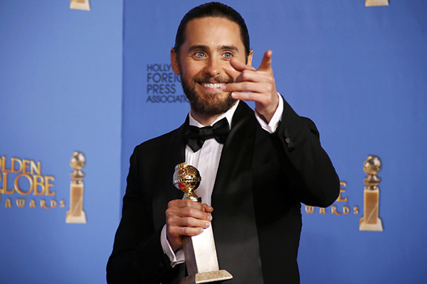 Jared Leto poses backstage with his award for Best Supporting Actor in a Motion Picture for his role in "The Dallas Buyers Club" at the 71st annual Golden Globe Awards in Beverly Hills
