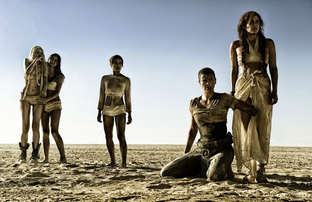 This photo provided by Warner Bros. Pictures shows, from left, Abbey Lee as The Dag, Courtney Eaton as Cheedo the Fragile, Zoe Kravitz as Toast the Knowing, Charlize Theron as Imperator Furiosa and Riley Keough as Capable, in Warner Bros. Pictures and Village Roadshow Pictures action adventure film, Mad Max:Fury Road," a Warner Bros. Pictures release. (Jasin Boland/Warner Bros. Pictures via AP)